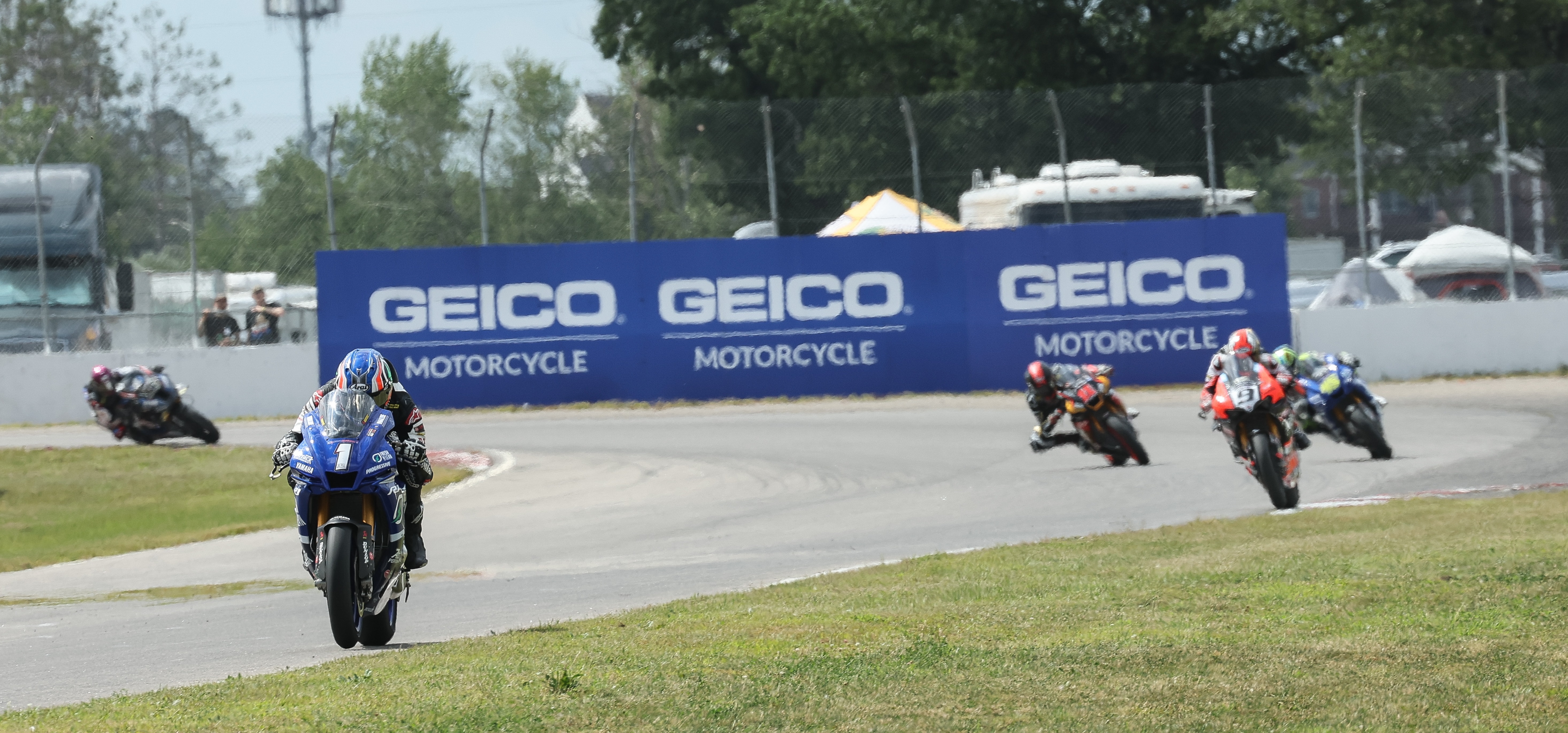 Jake Gagne leading Danilo Petrucci by a wide margin on the track at Brainerd International Raceway