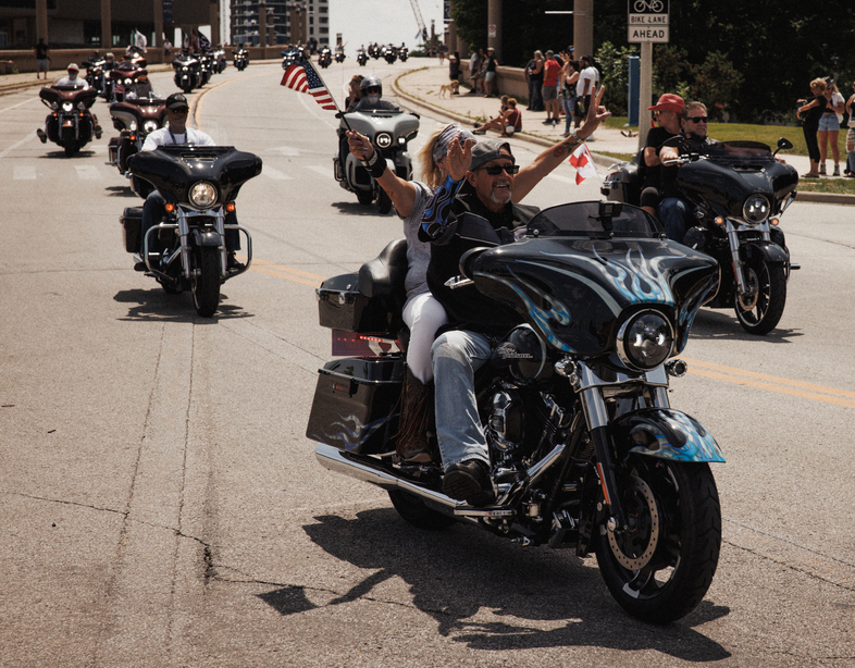 middle-aged riders at the Harley-Davidson Homecoming anniversary celebration in Milwaukee