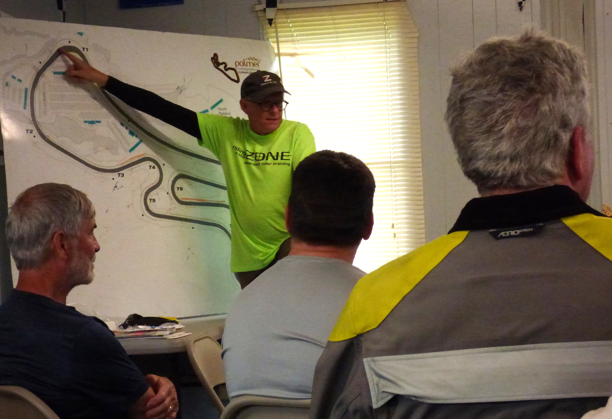 Ken Condon explains a point at the whiteboard