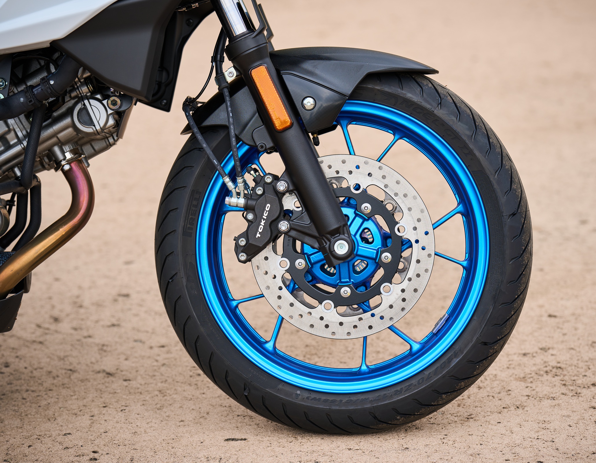 close view of the front wheel and brakes